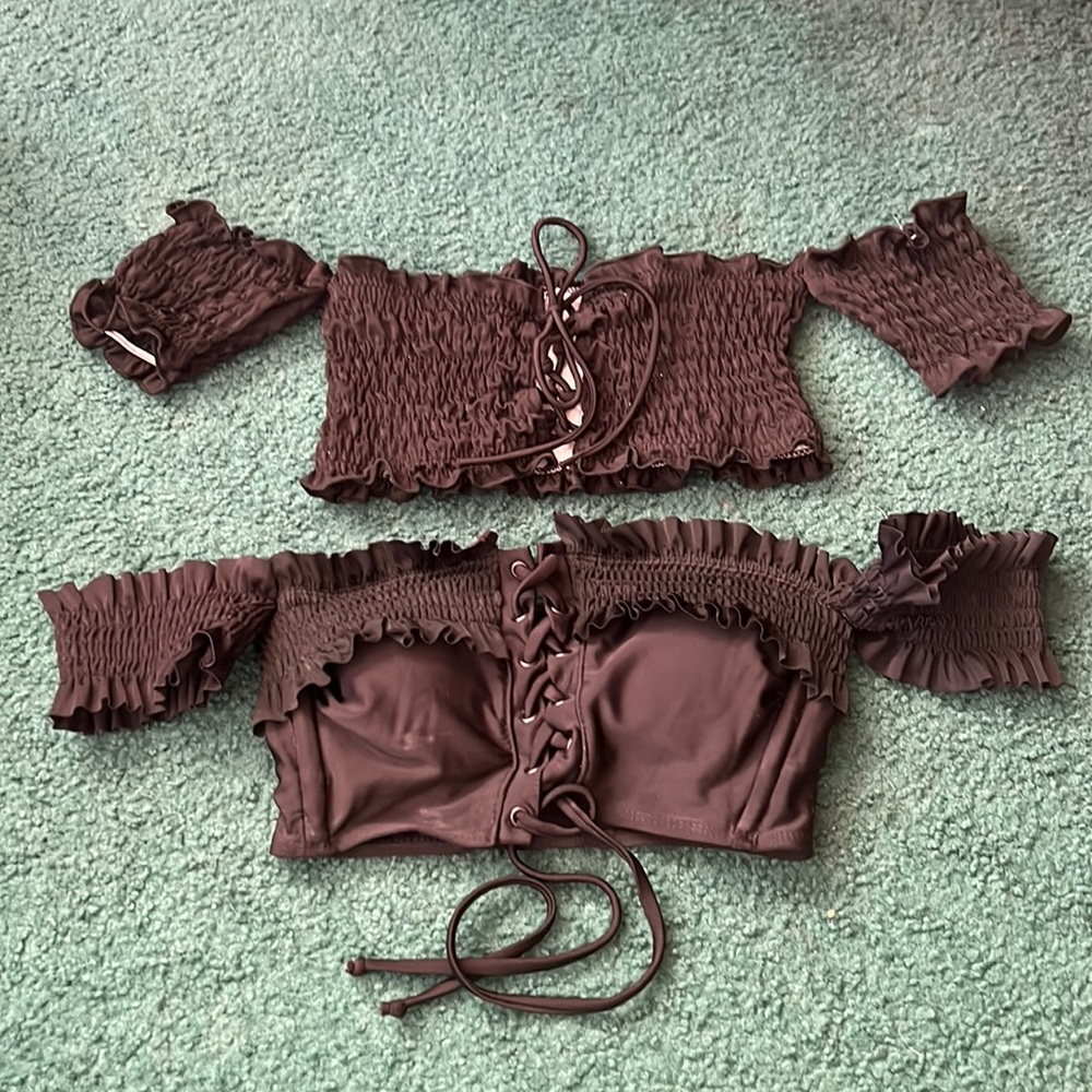 2 black bikini tops
